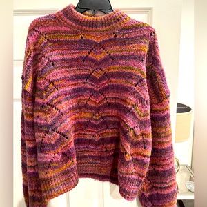 Colorful, vibrant seater! Stylish and cozy!